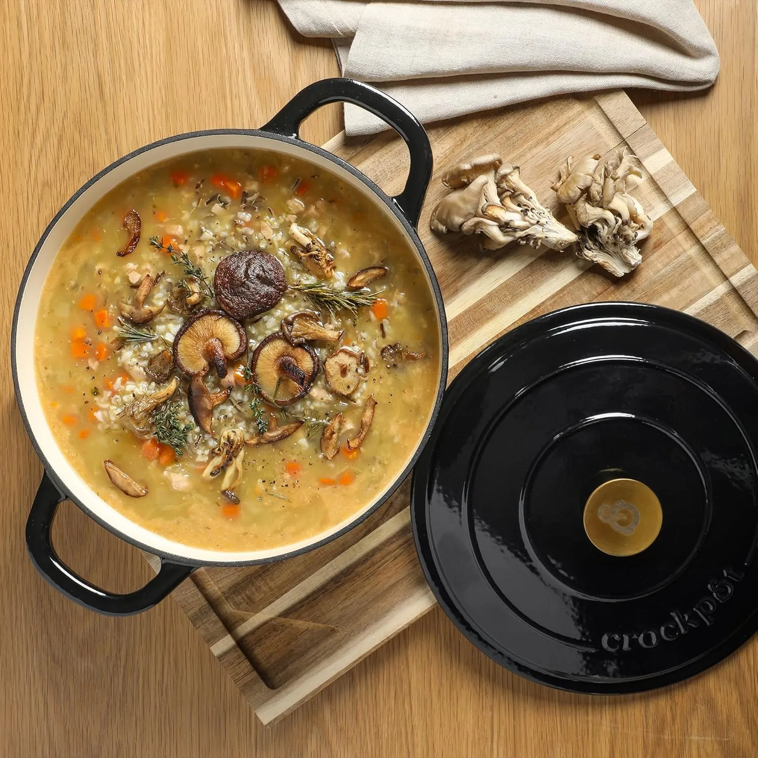 Crock Pot Artisan 7-Quart Round Cast Iron Dutch Oven With Lid - Black W/Gold Knob