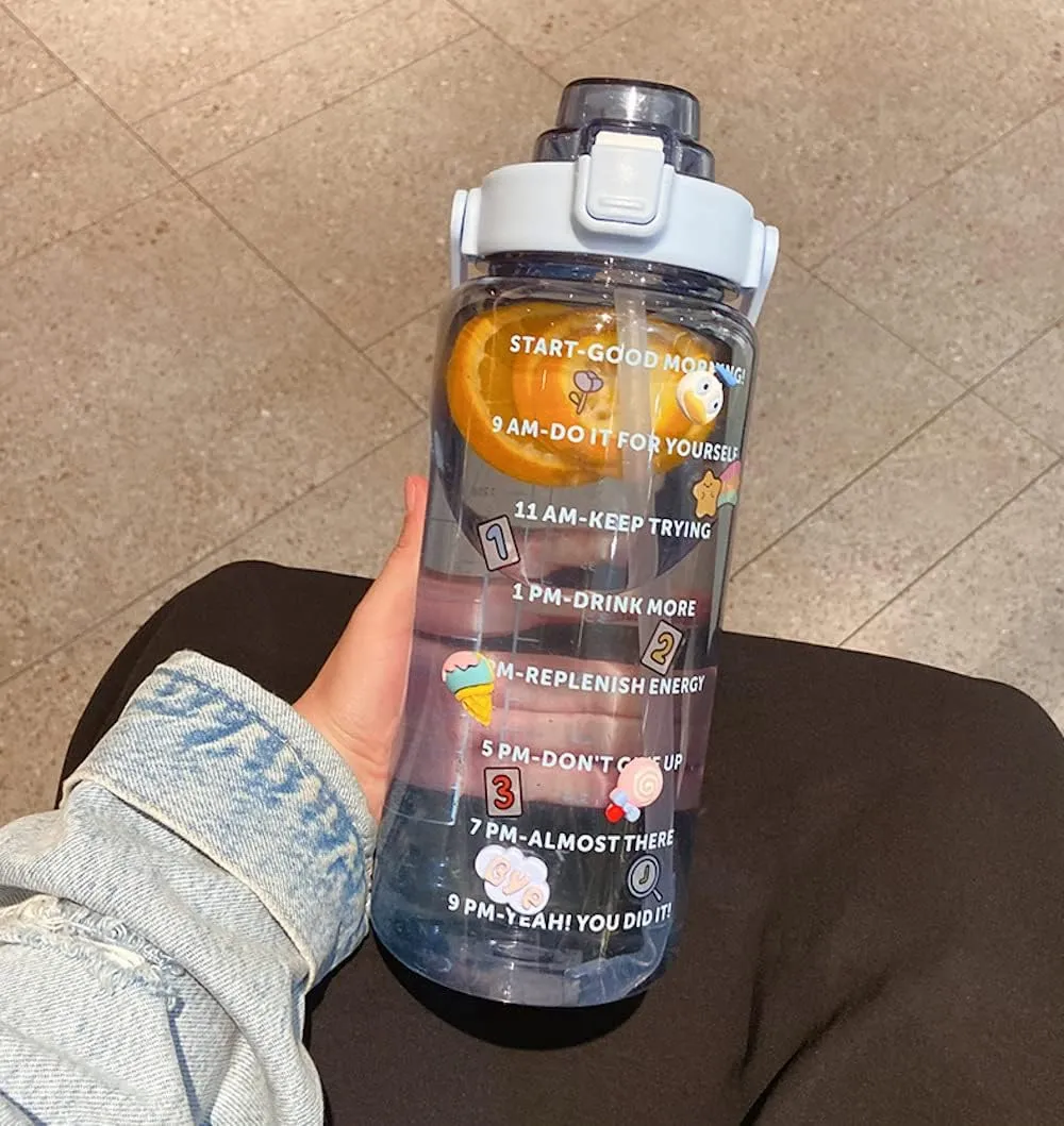 Large Kawaii Clear Gallon Water Bottle with Time Marker and Straw 70oz Kawaii Water Bottle with and Resin Stickers Portable Giant Drinking Bottle for School Sports Yoga Spill Proof Water Jug (Blue)