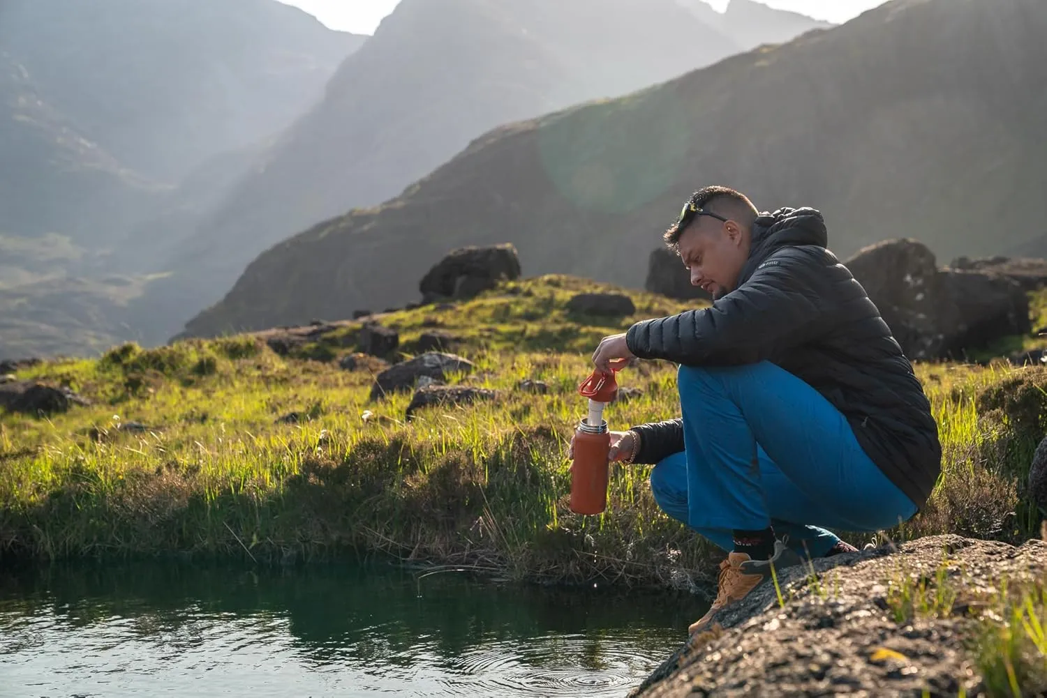 LifeStraw Go Series — Insulated Stainless Steel Water Filter Bottle for Travel and Everyday Use Removes Bacteria, Parasites and Microplastics, Improves Taste, 1L Kyoto Orange
